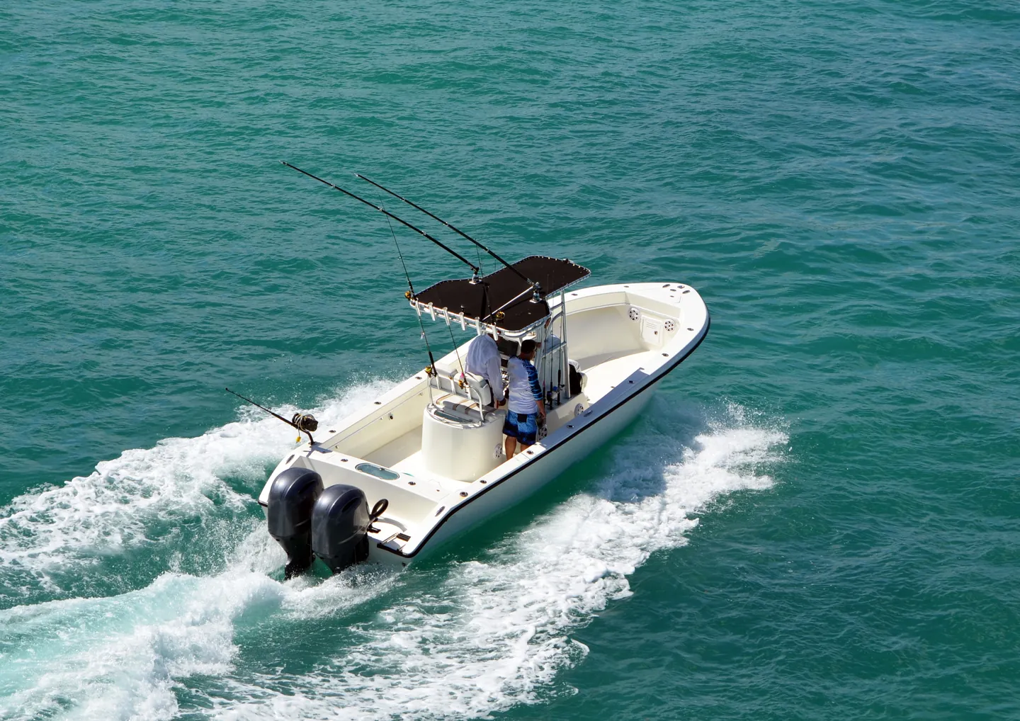 Charter boat underway on open coastal water